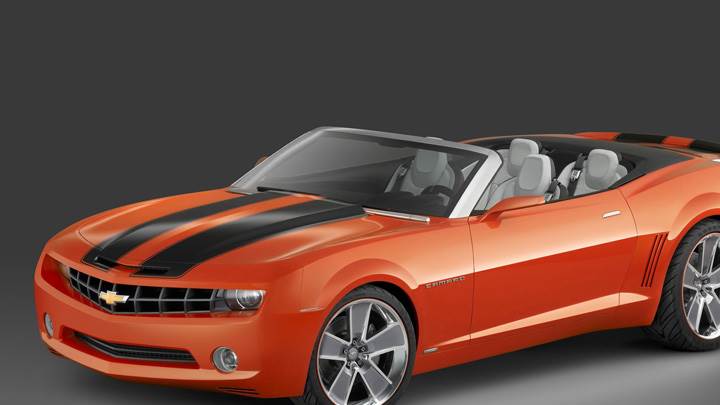 Chevrolet Camaro Convertible Side Front Pose In Orange